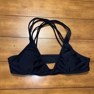 Black triangle style bikini top. Fits like size medium. Removable bust cups